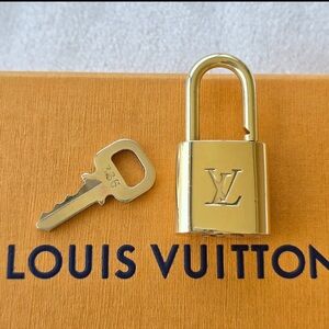 Louis Vuitton Shiny Gold Lock and Key Set